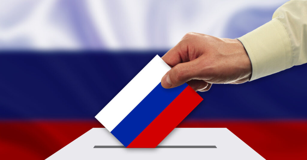 ロシアの国旗のカードを投票箱に入れるイメージ